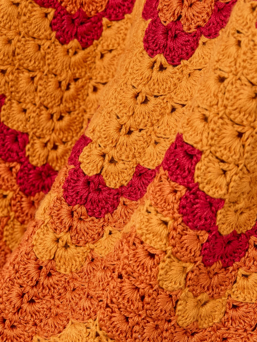 Close-up detail of the Escvdo Sumac Scalloped Crocheted Cotton Mini Dress