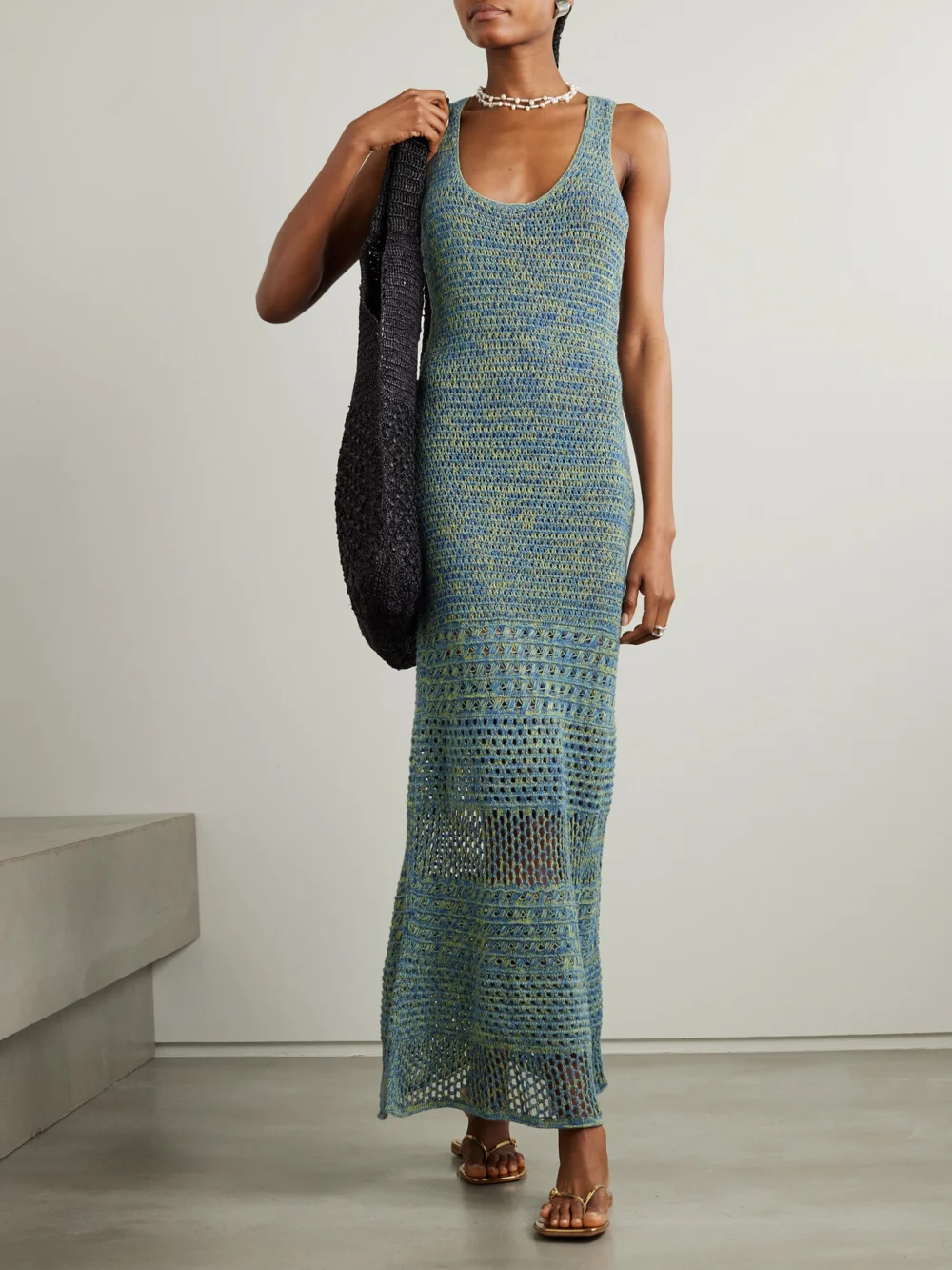 Escvdo Twist-back Pointelle-knit Cotton Maxi Dress, worn by a model