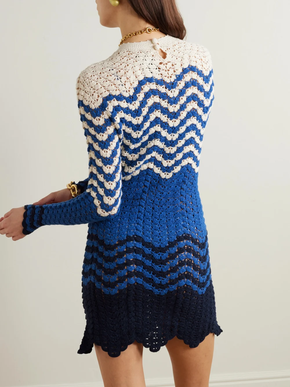 Back view of the Escvdo Victoria Striped Crocheted Cotton Mini Dress