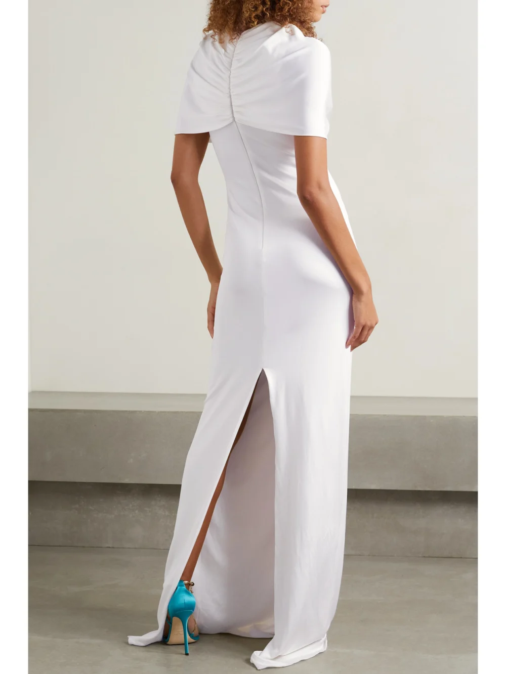 Back view of the Et Ochs Cape-effect Cutout Ruched Stretch-jersey Gown