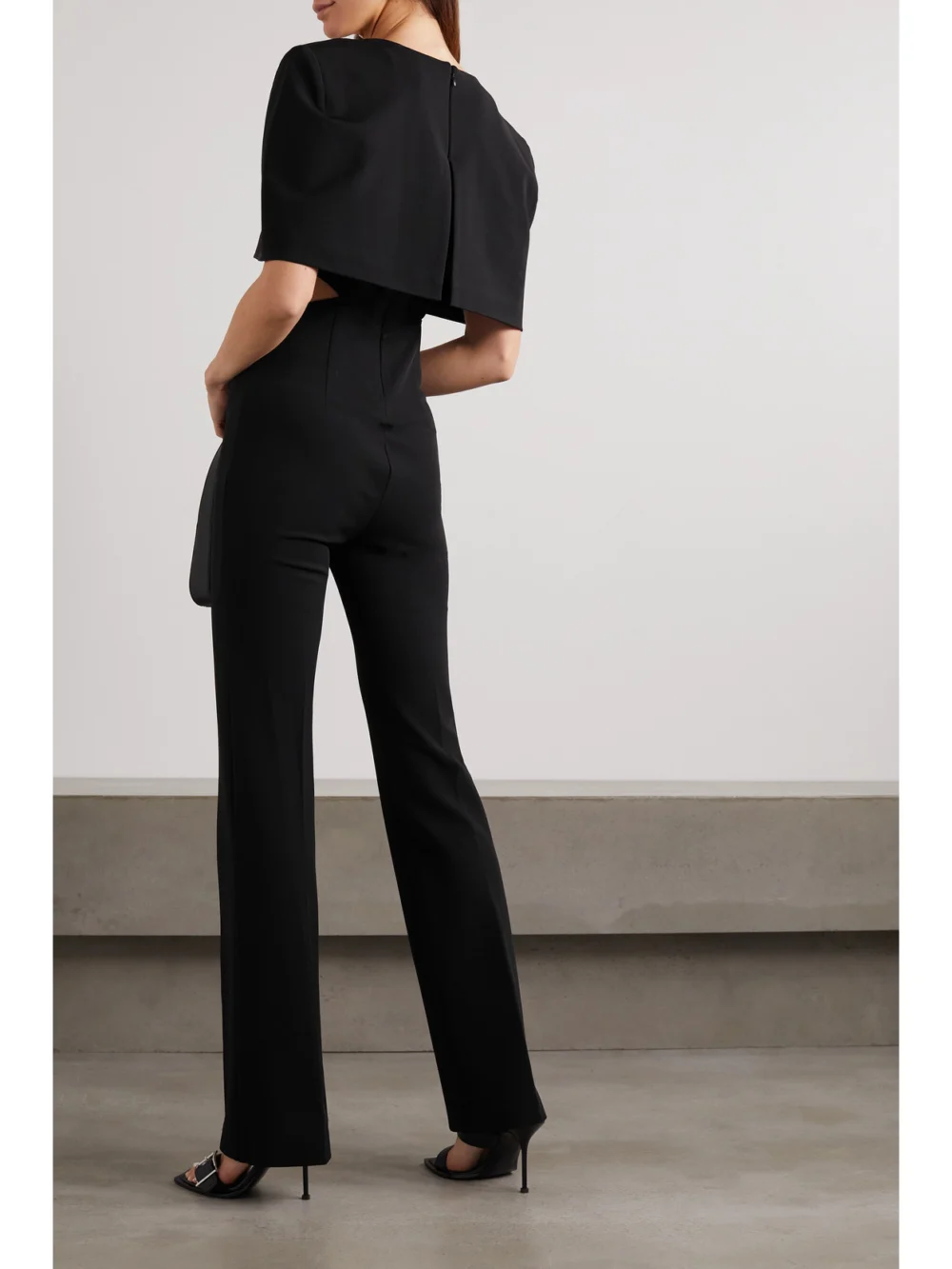 Back view of the Et Ochs Conner Cape-effect Cutout Stretch-cady Jumpsuit