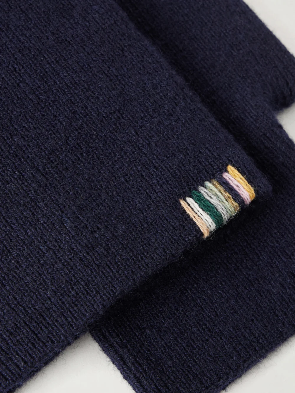 Close-up detail of the Extreme Cashmere Mouffle Knitted Cashmere-blend Fingerless Gloves