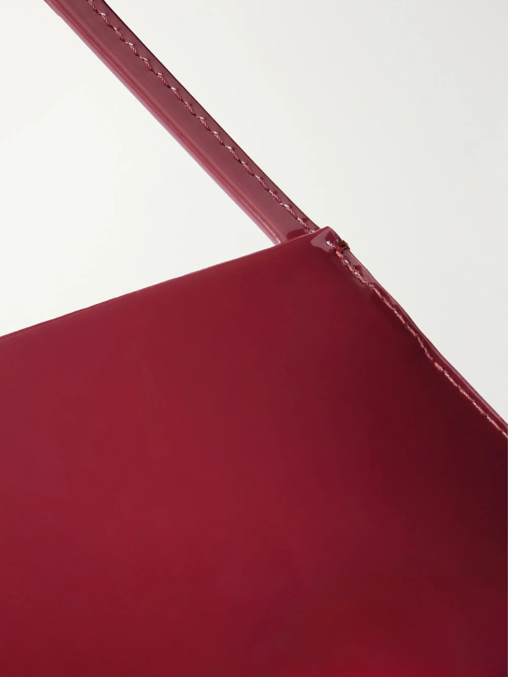 Close-up detail of the Fane Bra Patent Leather Shoulder Bag