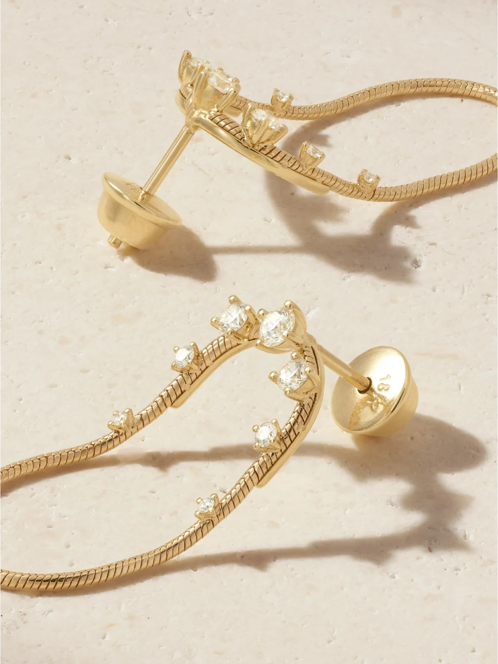 Close-up detail of the Fernando Jorge Parallel Short 18-karat Gold Diamond Earrings