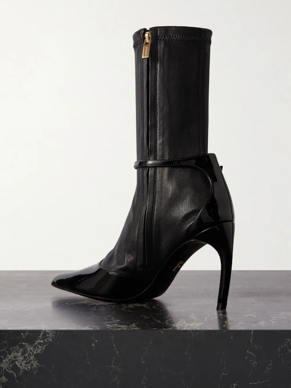 Back view of the Ferragamo Britt Smooth and Patent-leather Ankle Boots