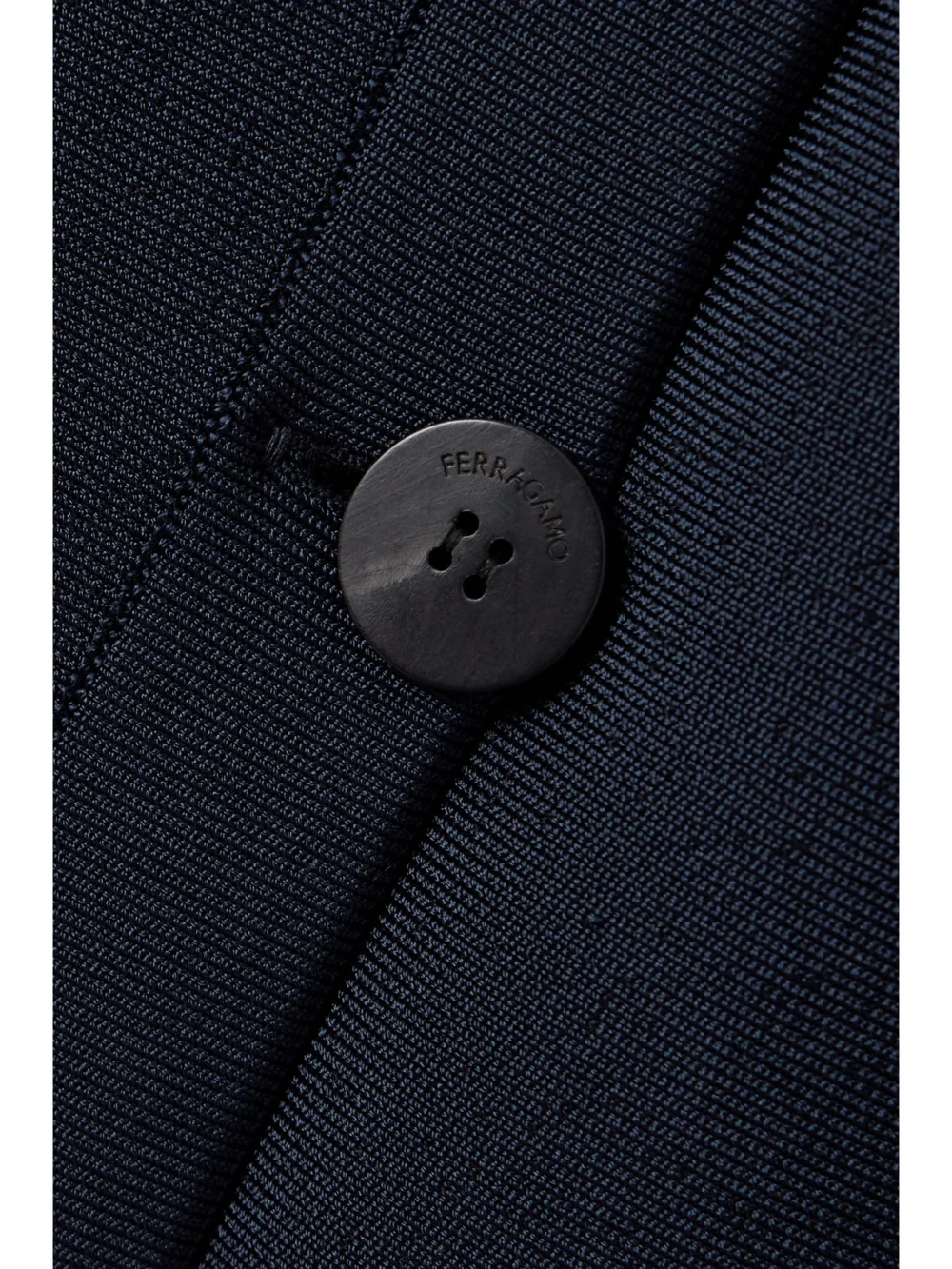 Close-up detail of the Ferragamo Convertible Ponte Mini Dress