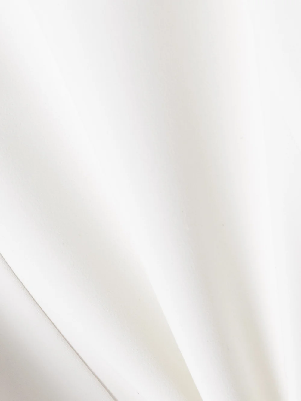 Close-up detail of the Ferragamo Crepe Mini Dress