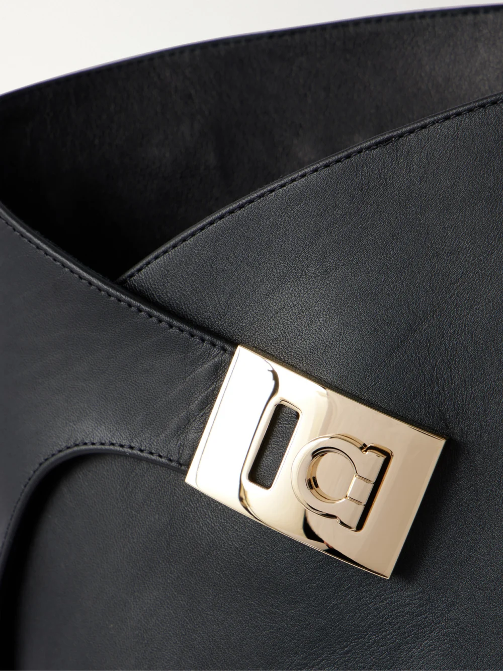 Close-up detail of the Ferragamo Elli 70 Embellished Leather Knee Boots