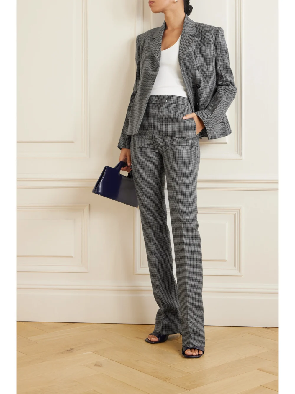 Ferragamo Houndstooth Wool-tweed Flared Pants, worn by a model