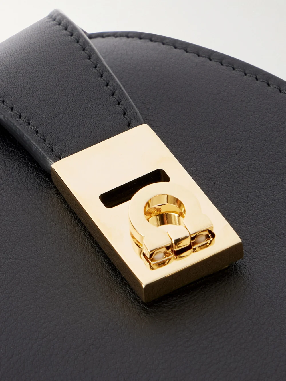 Close-up detail of the Ferragamo Hug Embellished Textured-leather Shoulder Bag