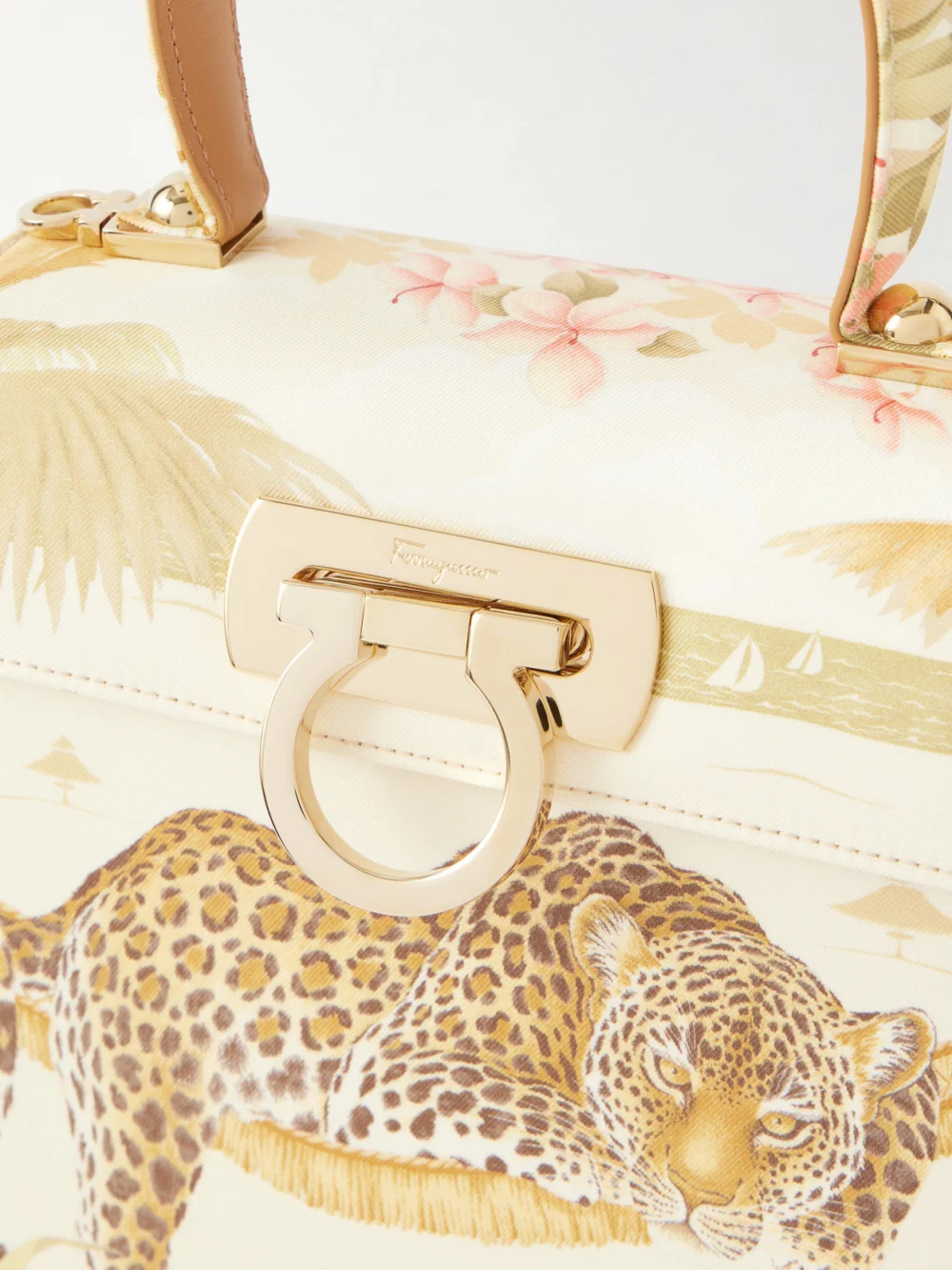 Close-up detail of the Ferragamo Leather-trimmed Printed Canvas Shoulder Bag