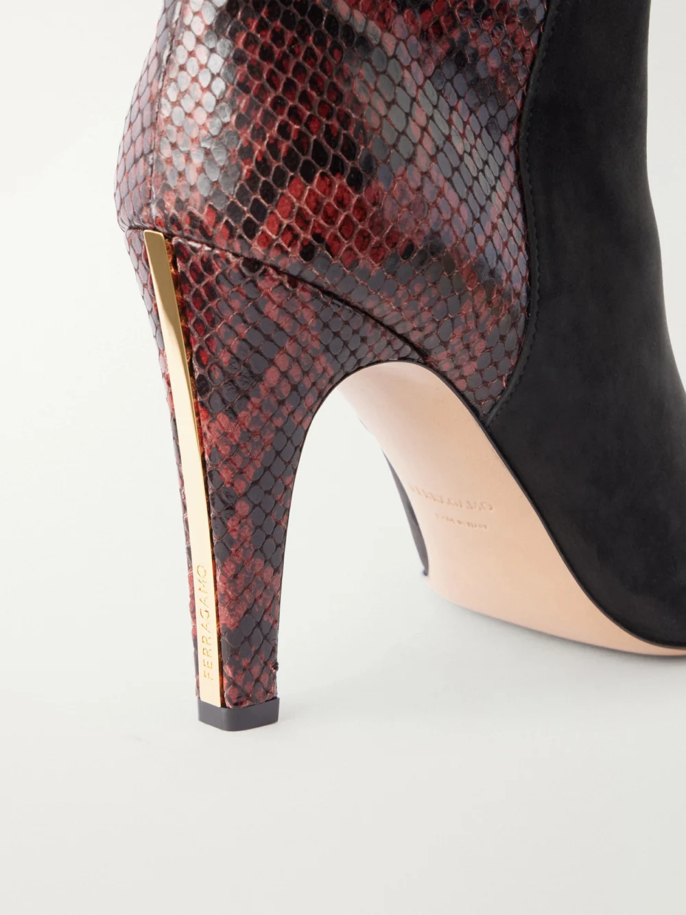 Close-up detail of the Ferragamo Nylu 95 Snake-effect Leather and Suede Boots