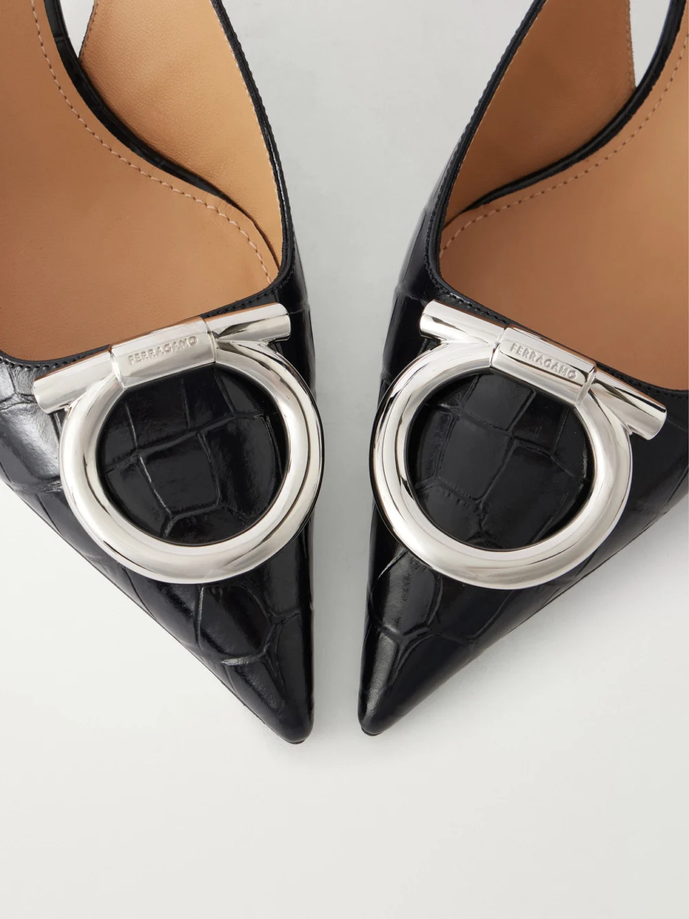 Close-up detail of the Ferragamo Sara 40 Embellished Croc-effect Leather Slingback Pumps