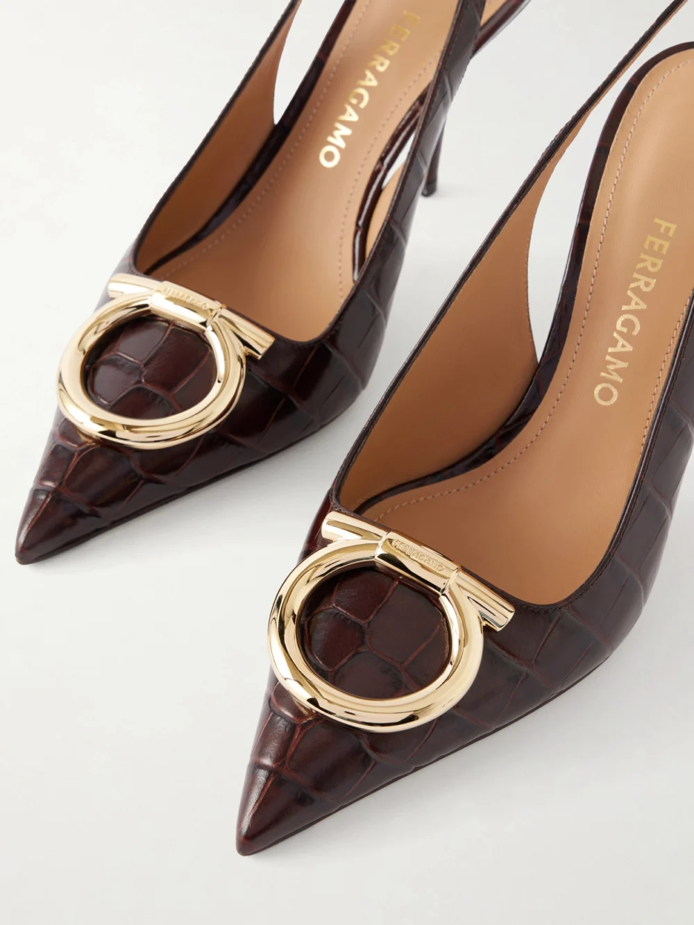 Close-up detail of the Ferragamo Sara 95 Croc-effect Leather Slingback Pumps