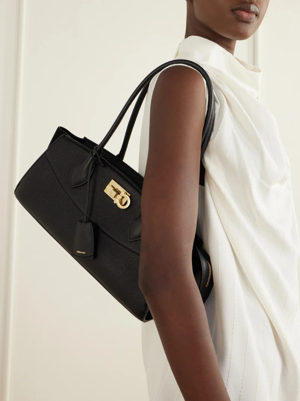 Ferragamo Studio East West Suede-trimmed Textured-leather Shoulder Bag, styled view