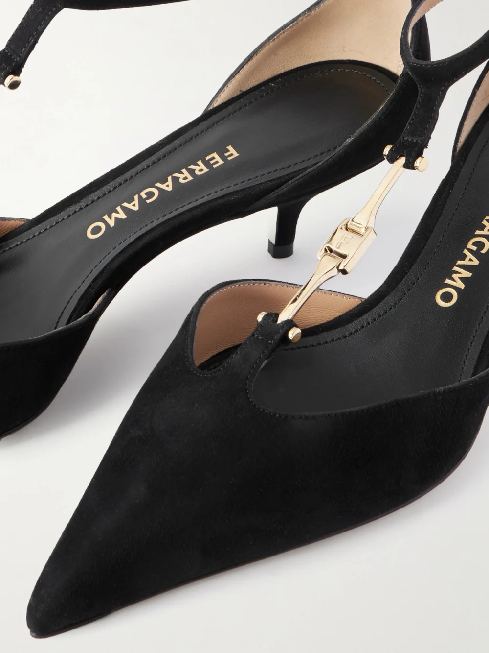 Close-up detail of the Ferragamo Traci Embellished Suede Pumps