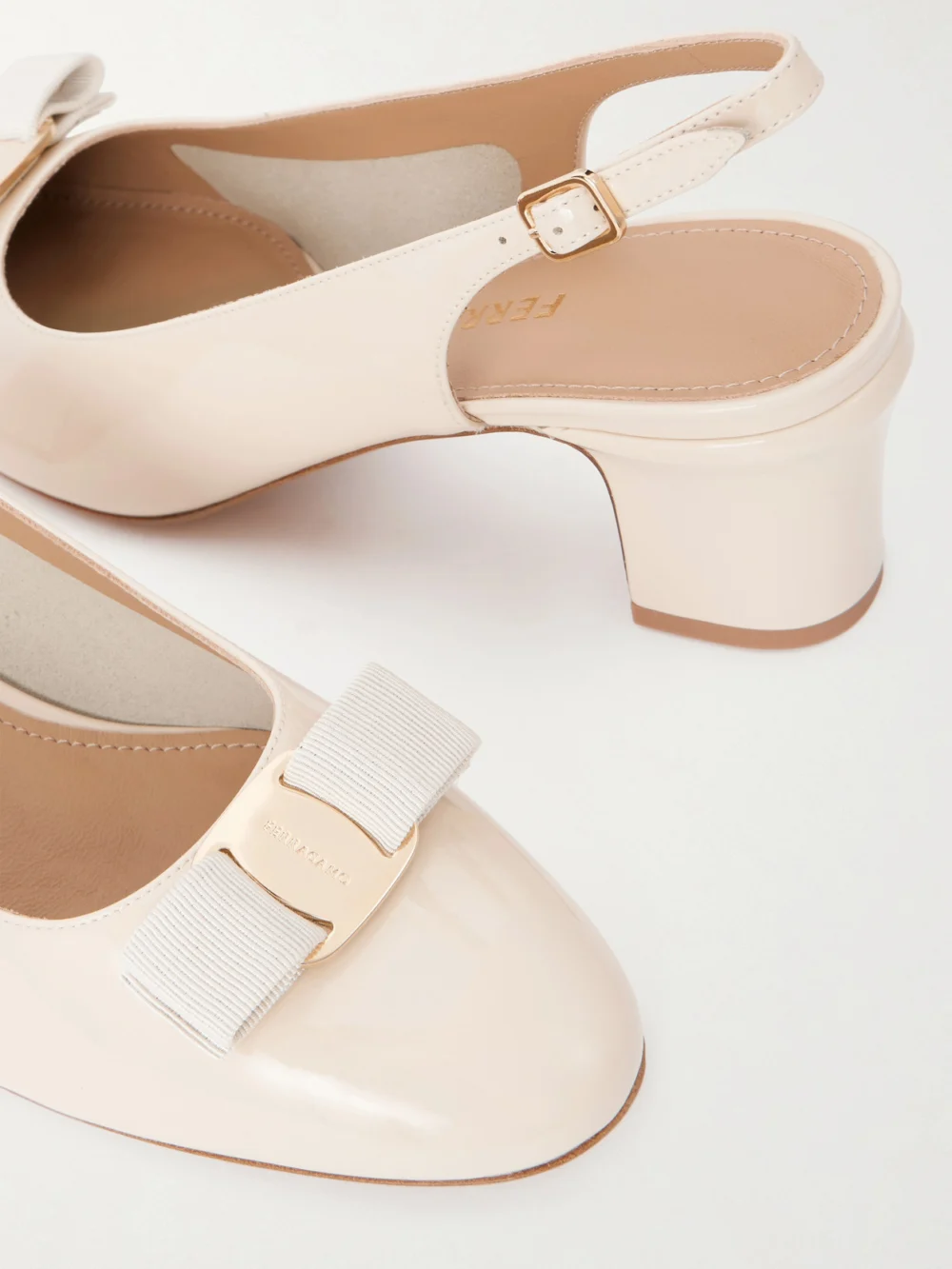 Close-up detail of the Ferragamo Vetty Bow-embellished Patent-leather Slingback Pumps