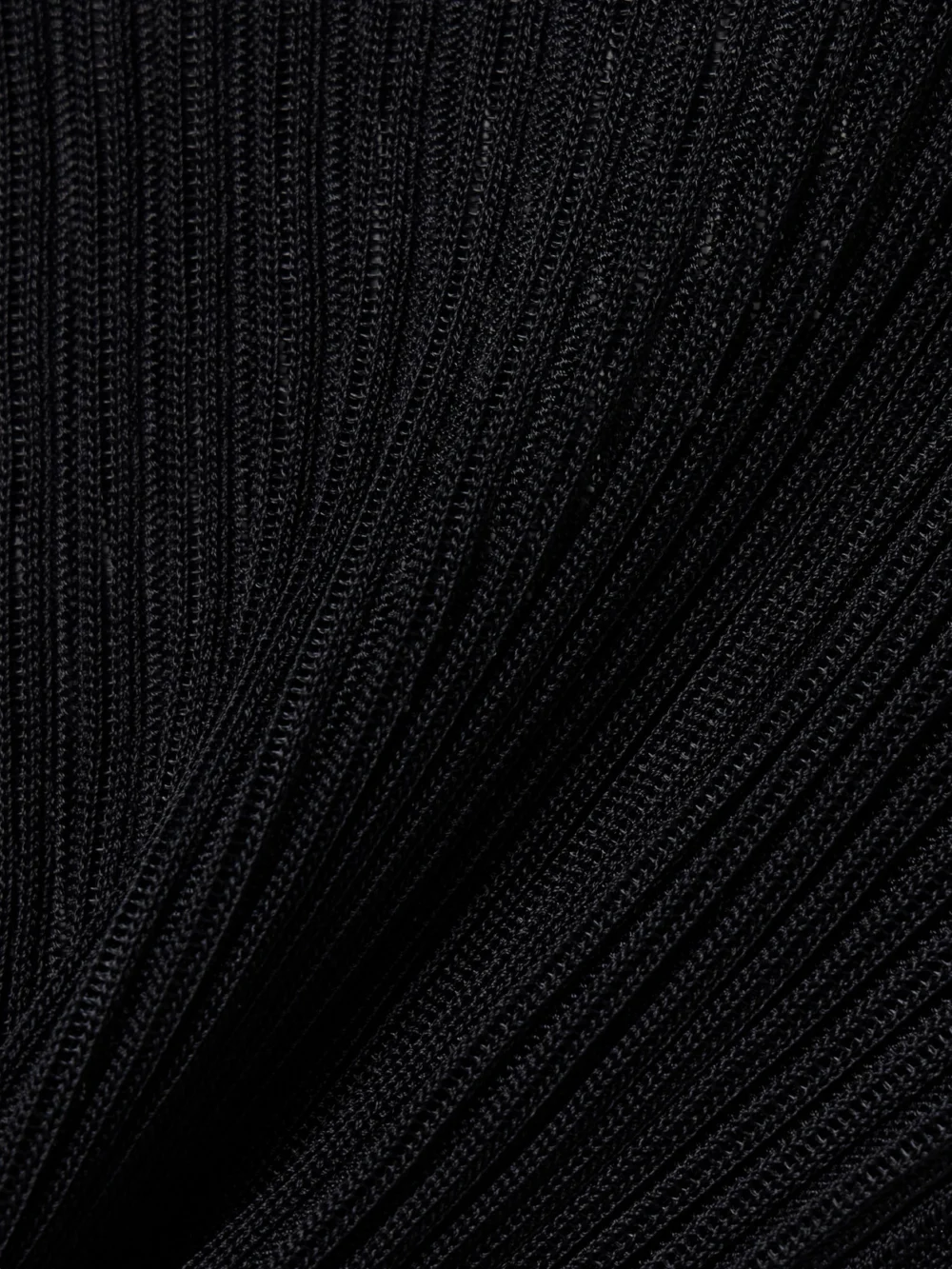 Close-up detail of the Fforme Elin Ribbed-knit Turtleneck Sweater