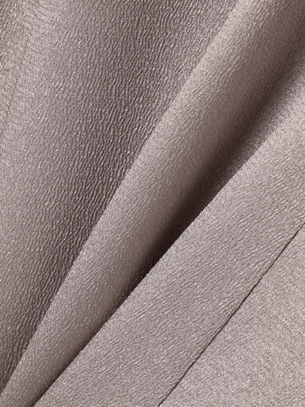 Close-up detail of the Fforme Iris Metallic Cloqué Maxi Dress