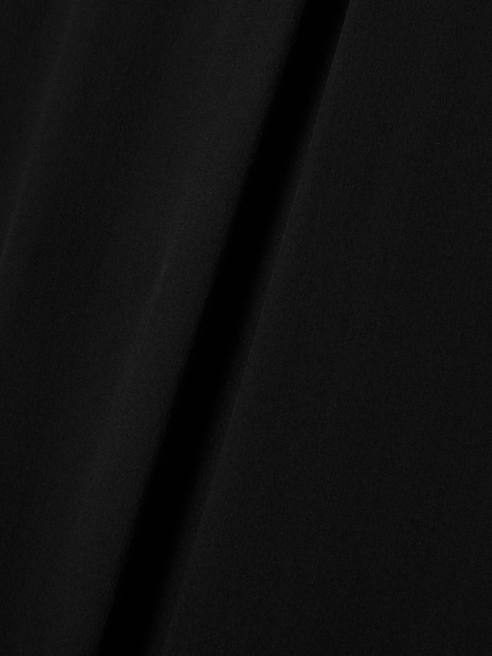 Close-up detail of the Fforme Lotta Pleated Silk Crepe De Chine Maxi Skirt