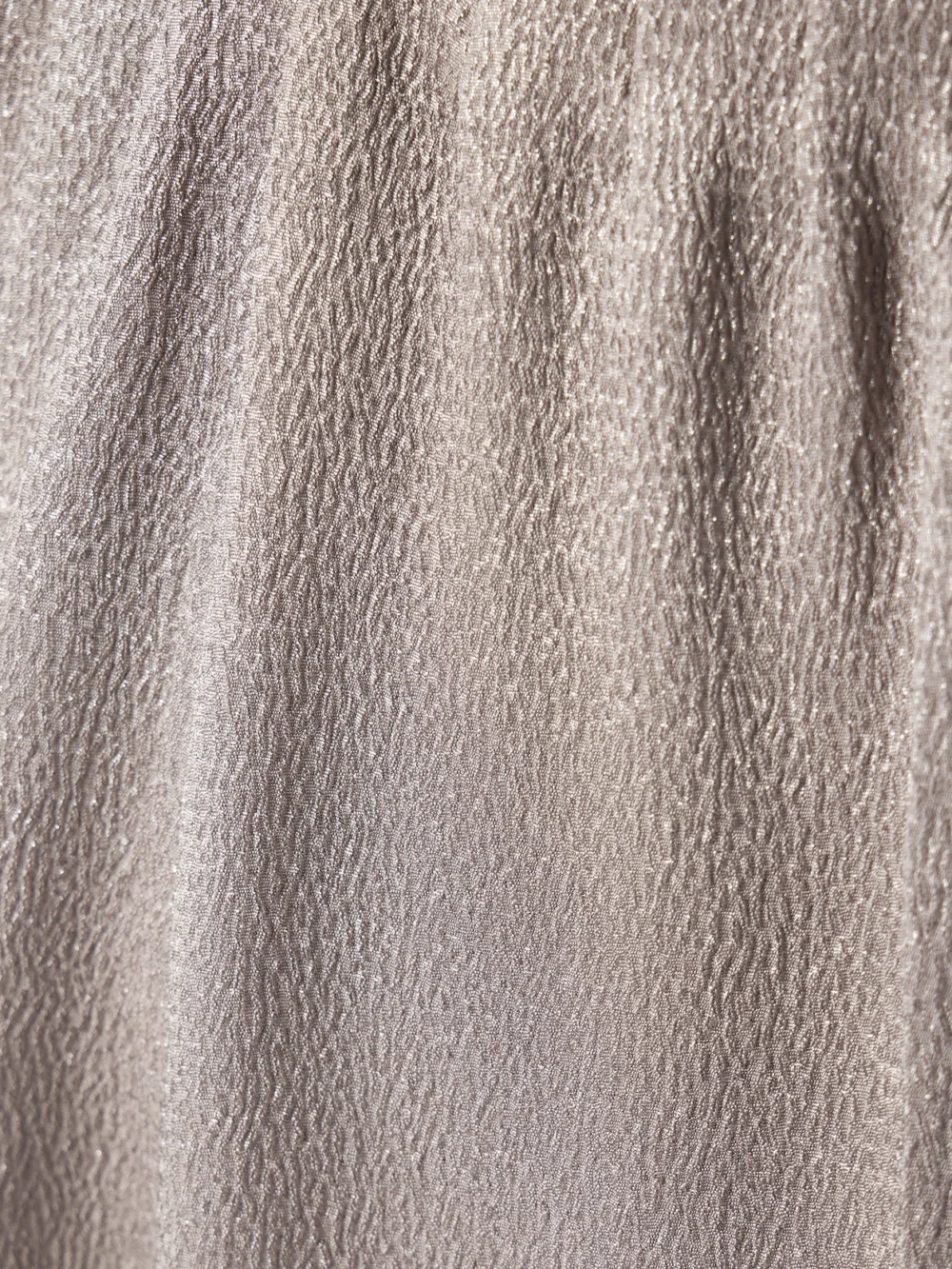 Close-up detail of the Fforme Maud Metallic Cloqué Wide-leg Pants