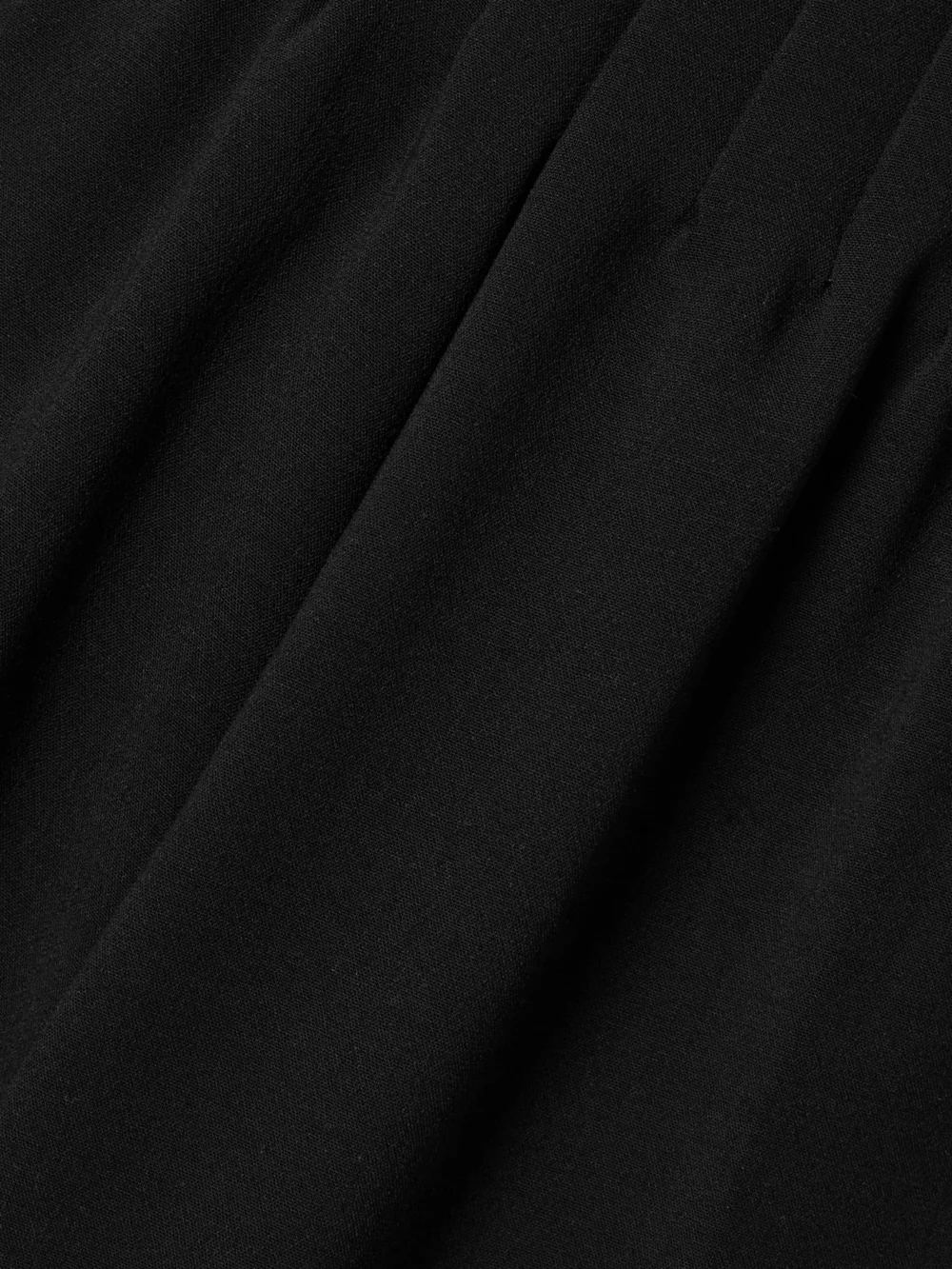 Close-up detail of the Fforme Maud Wool-blend Crepe Wide-leg Pants