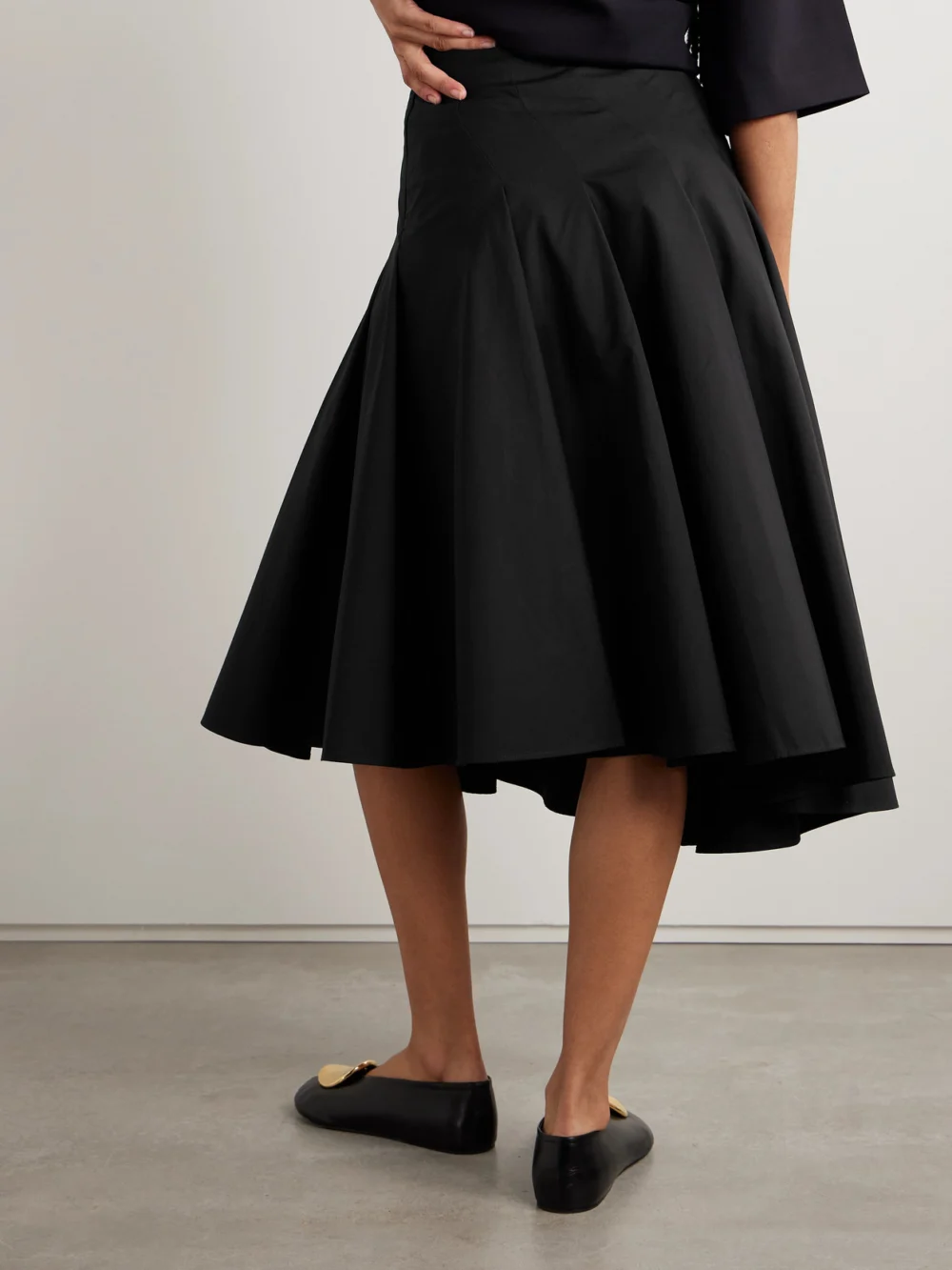 Back view of the Fforme Rio Asymmetric Paneled Cotton-poplin Midi Skirt