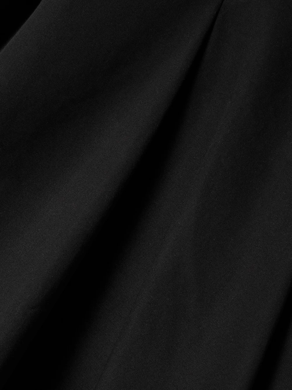 Close-up detail of the Fforme Rio Asymmetric Paneled Cotton-poplin Midi Skirt