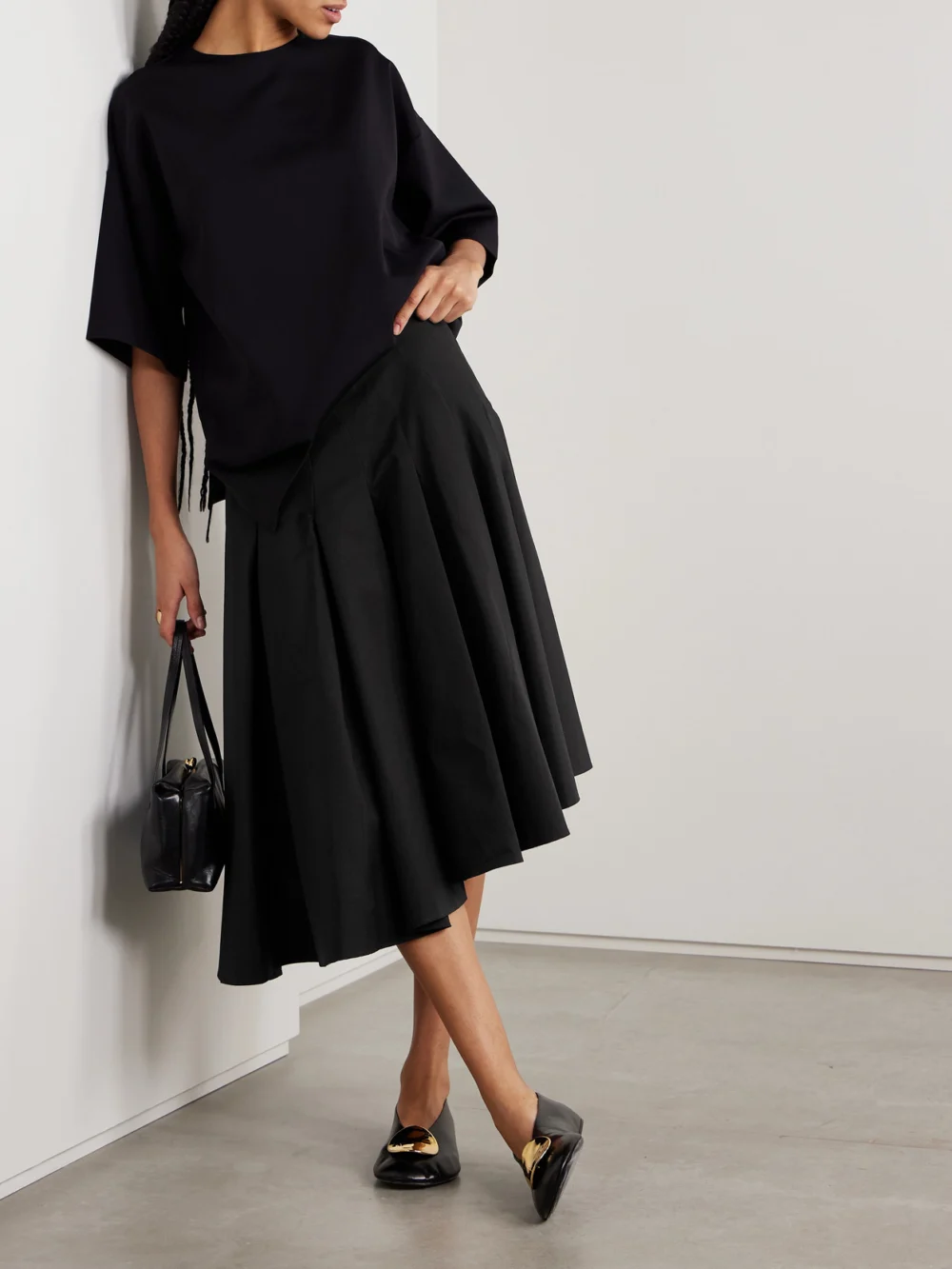 Fforme Rio Asymmetric Paneled Cotton-poplin Midi Skirt, worn by a model