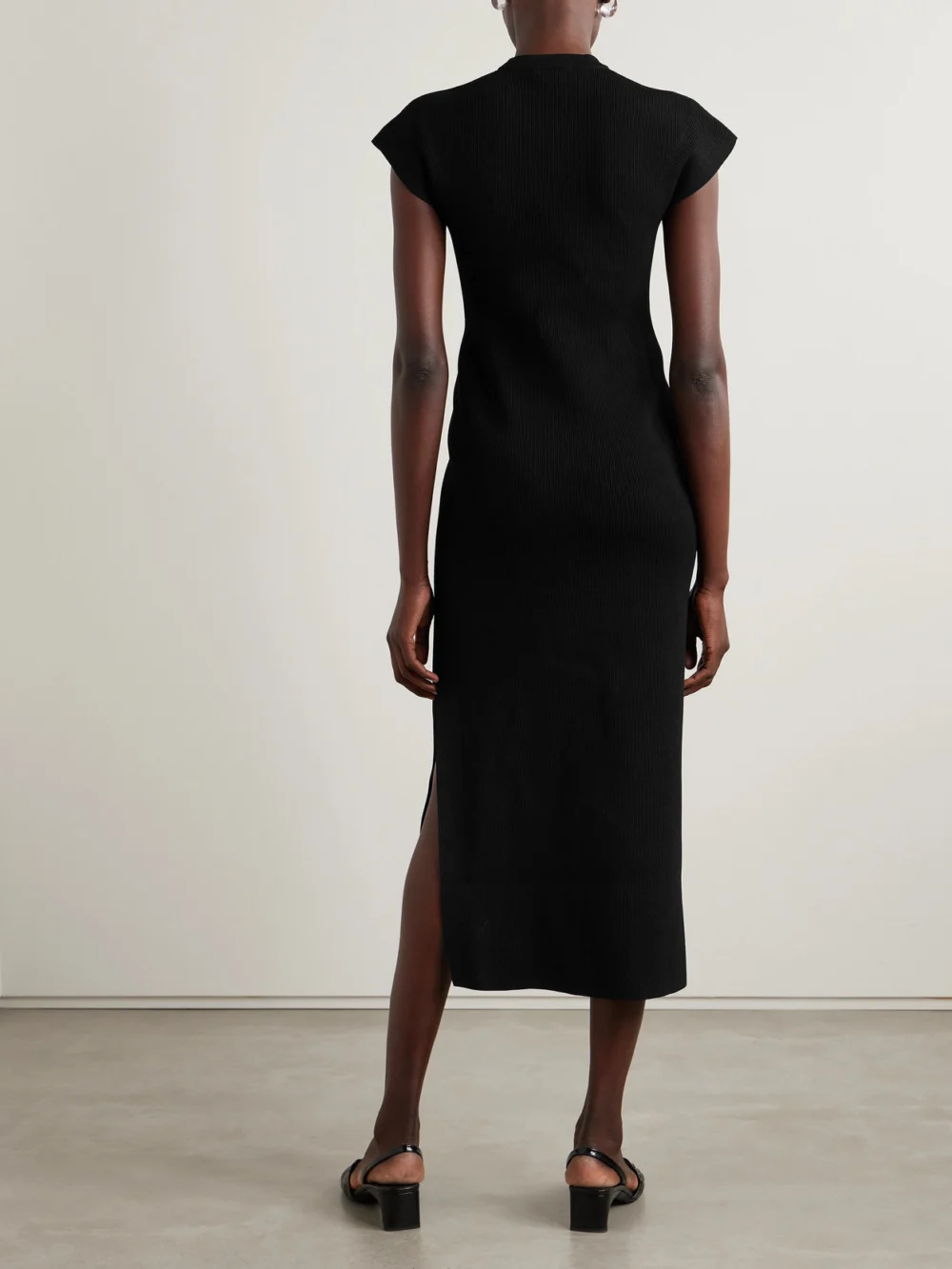 Back view of the Fforme Saiba Ribbed-knit Midi Dress