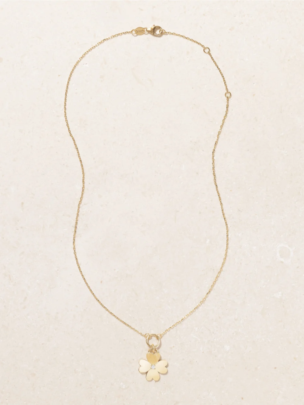 Close-up detail of the FoundRae Four Heart Clover 18-karat Gold, Enamel and Diamond Necklace