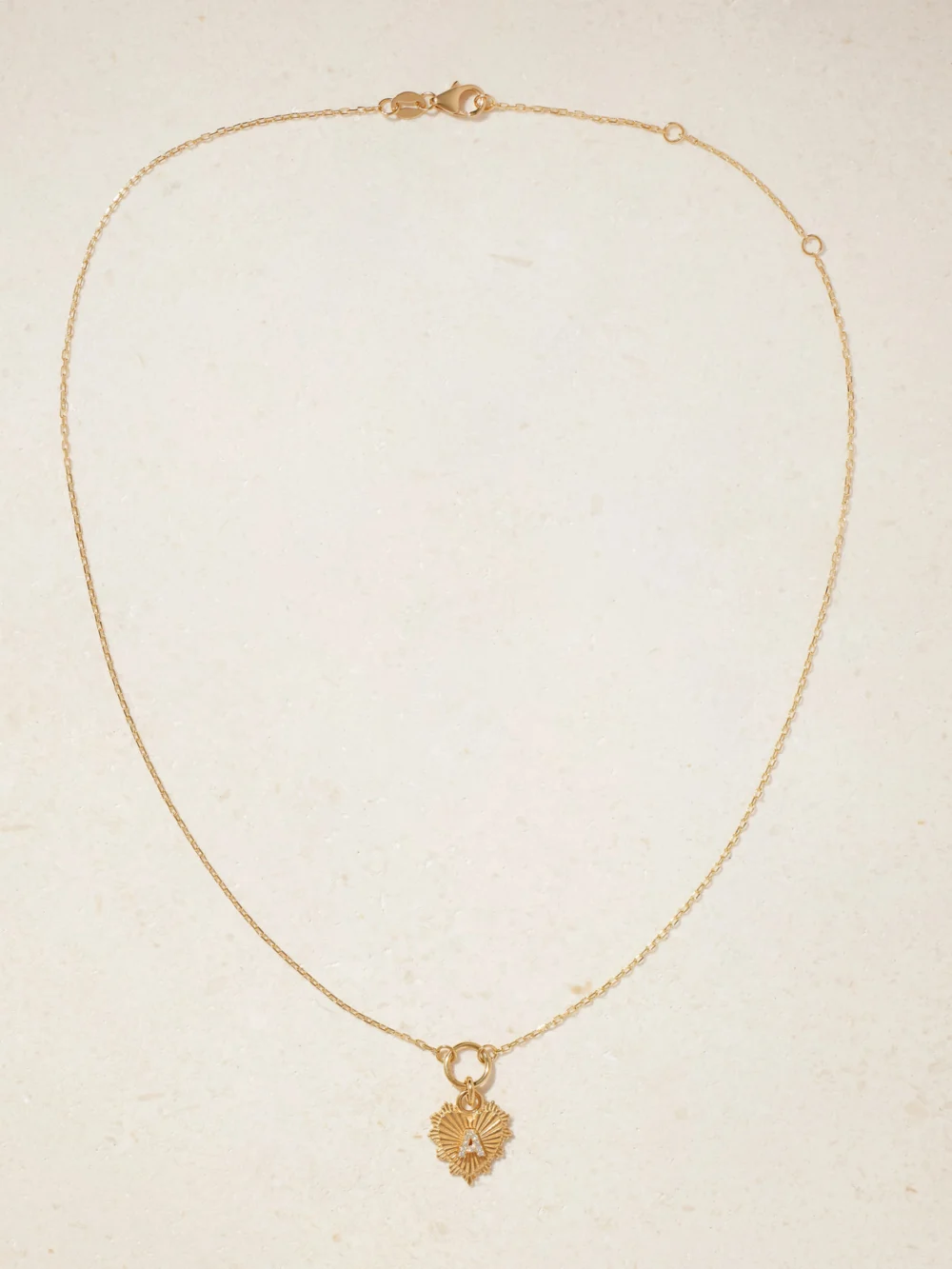 Close-up detail of the FoundRae Initial 18-karat Gold Diamond Necklace