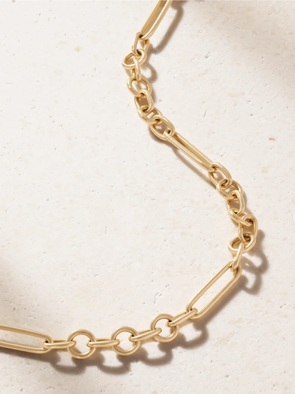 Close-up detail of the FoundRae Small Mixed Clip 18-karat Gold Necklace
