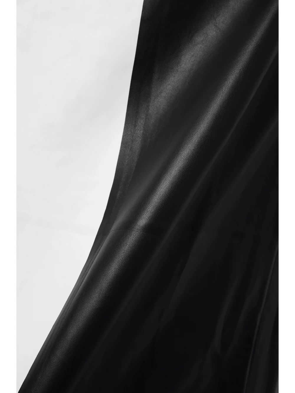 Close-up detail of the Gabriela Hearst Currie Cutout Two-tone Leather Maxi Dress