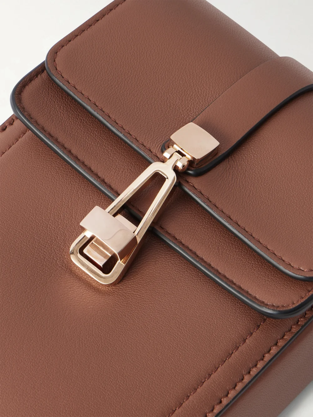 Close-up detail of the Gabriela Hearst Leather Phone Pouch