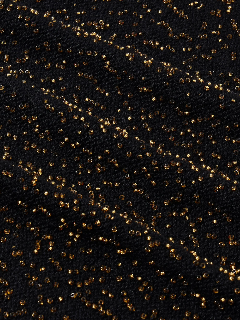 Close-up detail of the Gabriela Hearst Manasa Bead-embellished Cashmere Shoulder Bag
