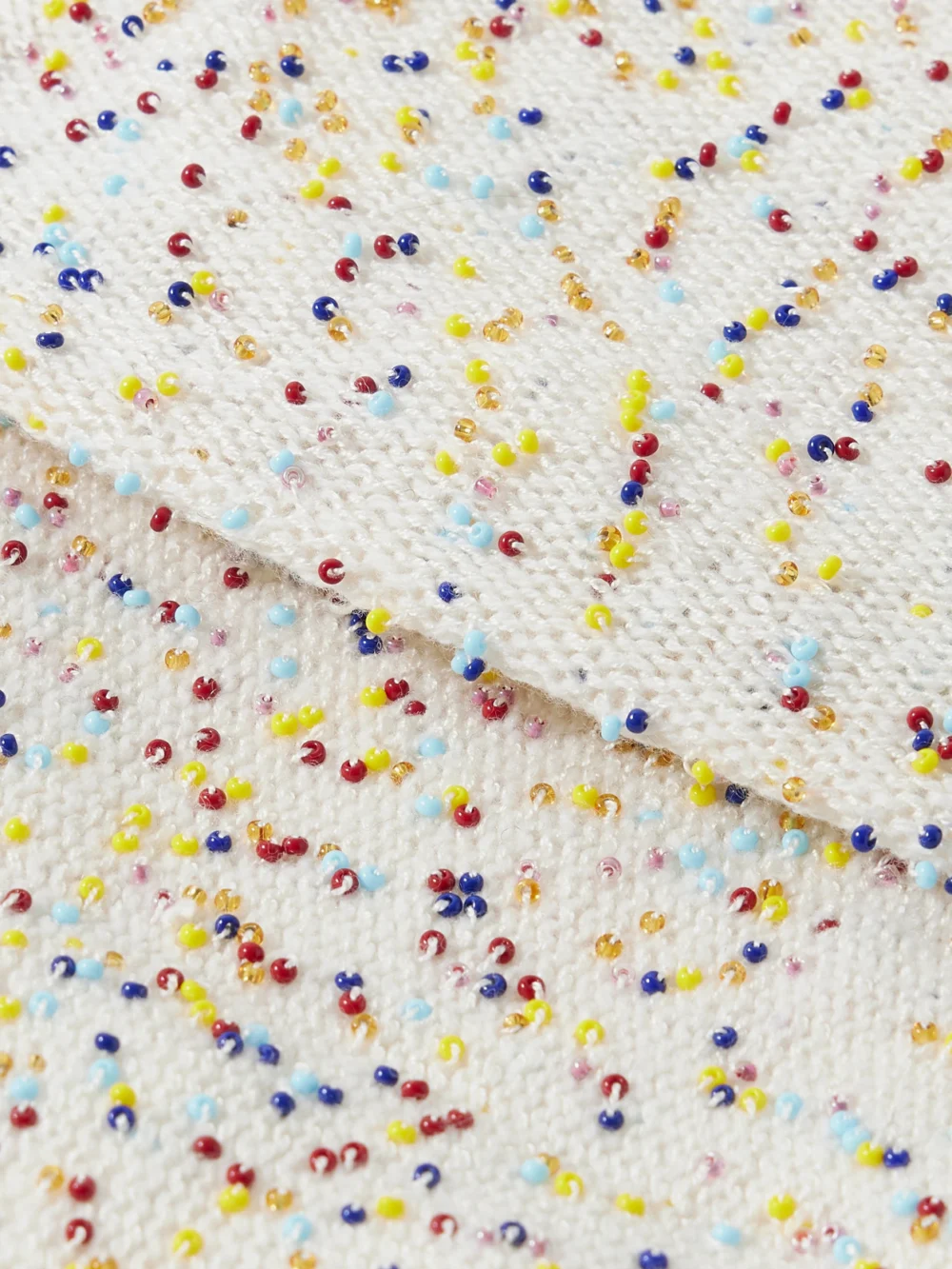 Close-up detail of the Gabriela Hearst Manasa Bead-embellished Cashmere Shoulder Bag