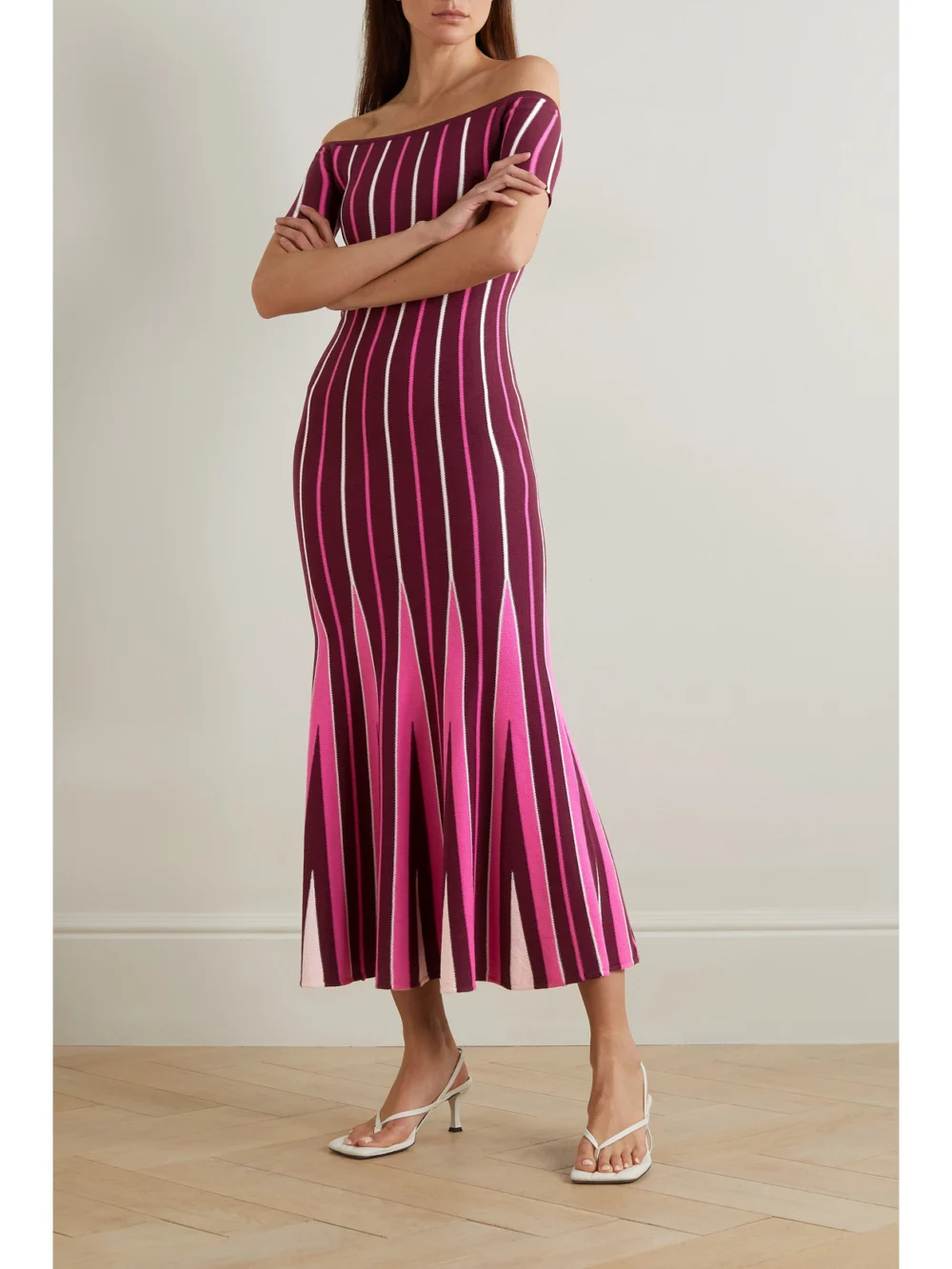 Gabriela Hearst Medea Off-the-shoulder Striped Wool Maxi Dress, worn by a model