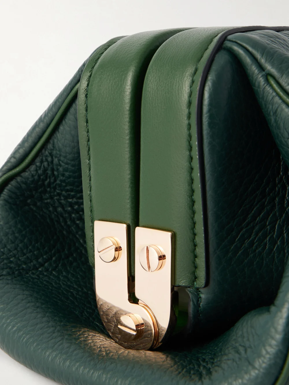 Close-up detail of the Gabriela Hearst Paola Textured-leather Clutch