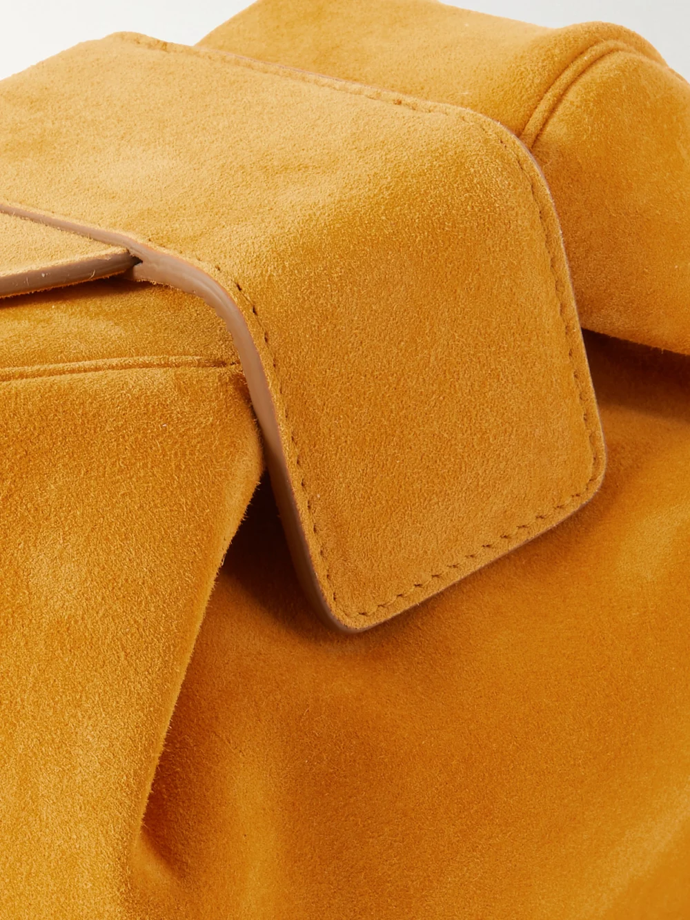 Close-up detail of the Gabriela Hearst Soft Demi Suede Clutch