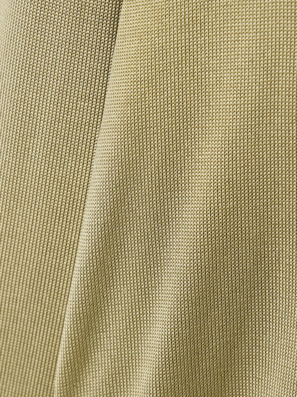 Close-up detail of the Galvan Ida Scarf-detailed Metallic Jersey Top