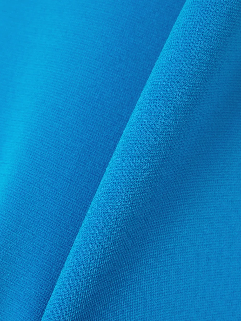 Close-up detail of the Galvan Kali Cutout Stretch-knit Midi Dress