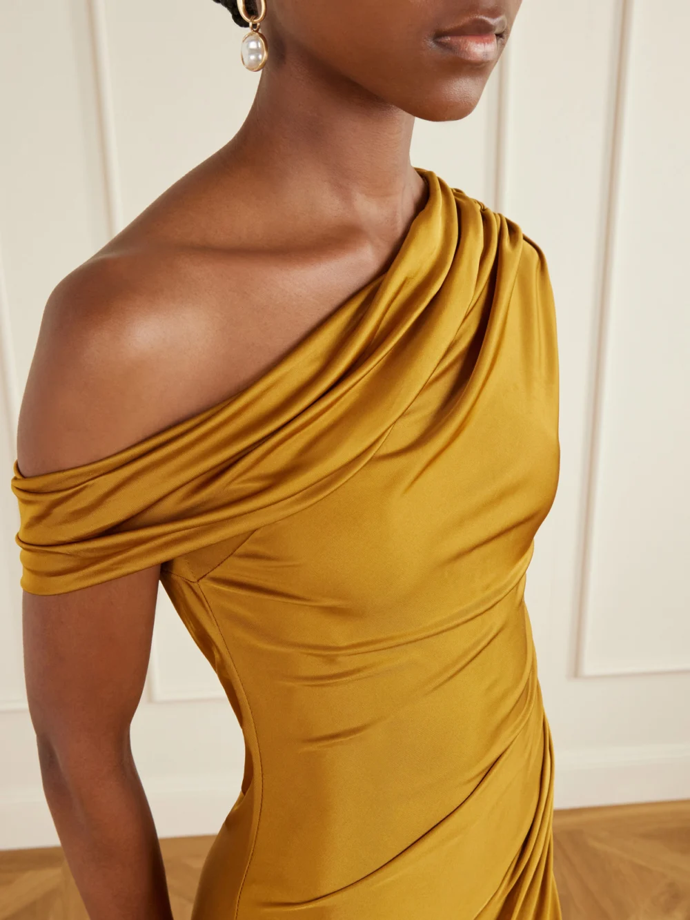 Close-up detail of the Galvan Off-the-shoulder Draped Satin-jersey Maxi Dress