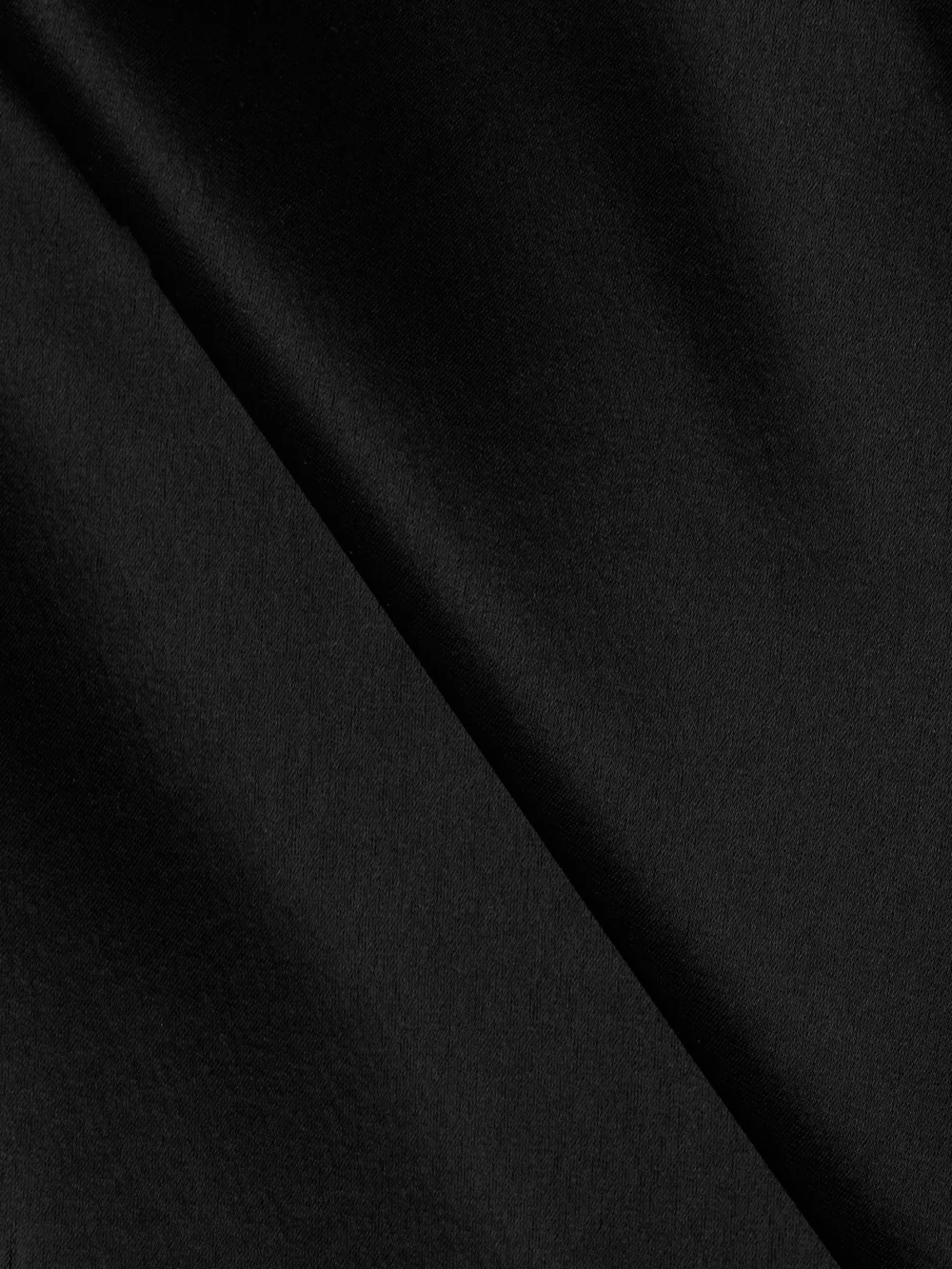 Close-up detail of the Galvan Pandora Satin Gown