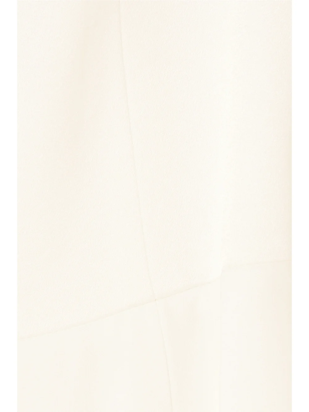 Close-up detail of the Galvan Paneled Crepe Jumpsuit