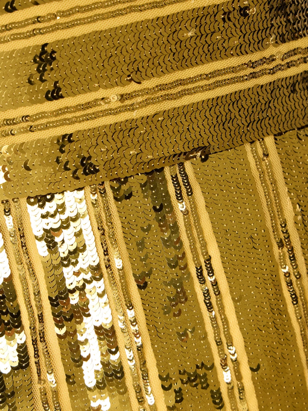 Close-up detail of the Galvan Stargaze Striped Sequined Tulle Maxi Dress