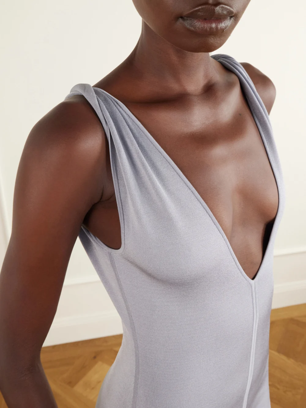 Close-up detail of the Galvan Twisted Tyra Stretch-knit Midi Dress