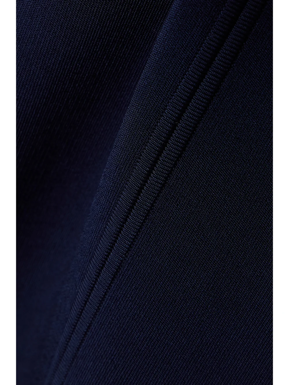 Close-up detail of the Galvan Tyra Stretch-knit Midi Dress