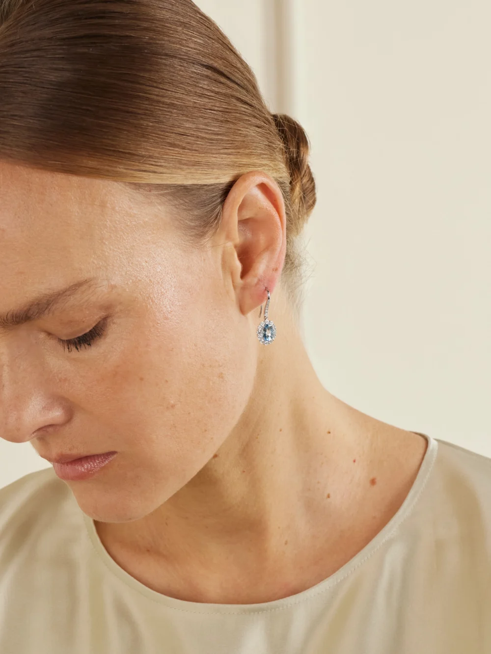 Garrard 1735 Platinum, Aquamarine and Diamond Earrings, styled view