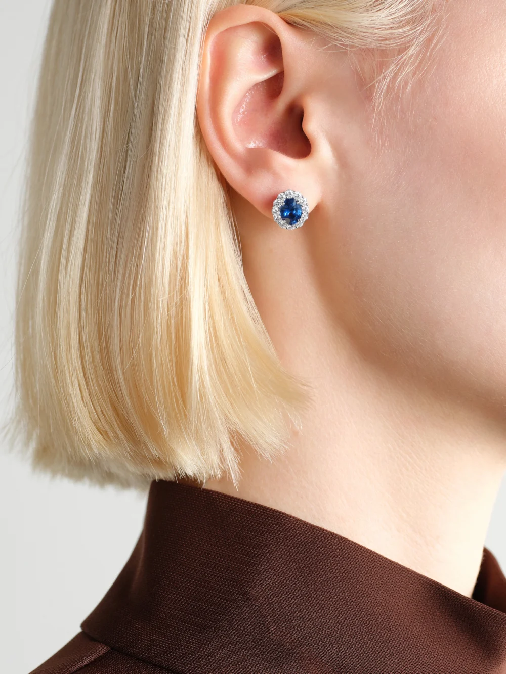 Garrard 1735 Platinum, Sapphire and Diamond Earrings, styled view